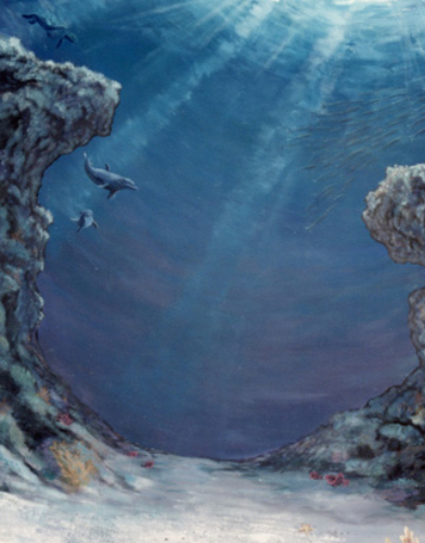 Underwater scene with divers exploring a deep ocean trench.